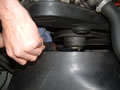 Loosening the nuts on the water pump fan clutch